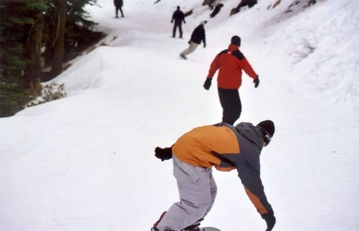 Tahoe Heavenly snowboarders traverse