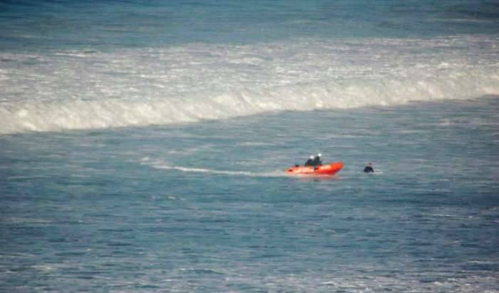 Del Mar surf lifeguard boat rescue surfer