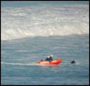 Del Mar surf lifeguard boat rescue surfer