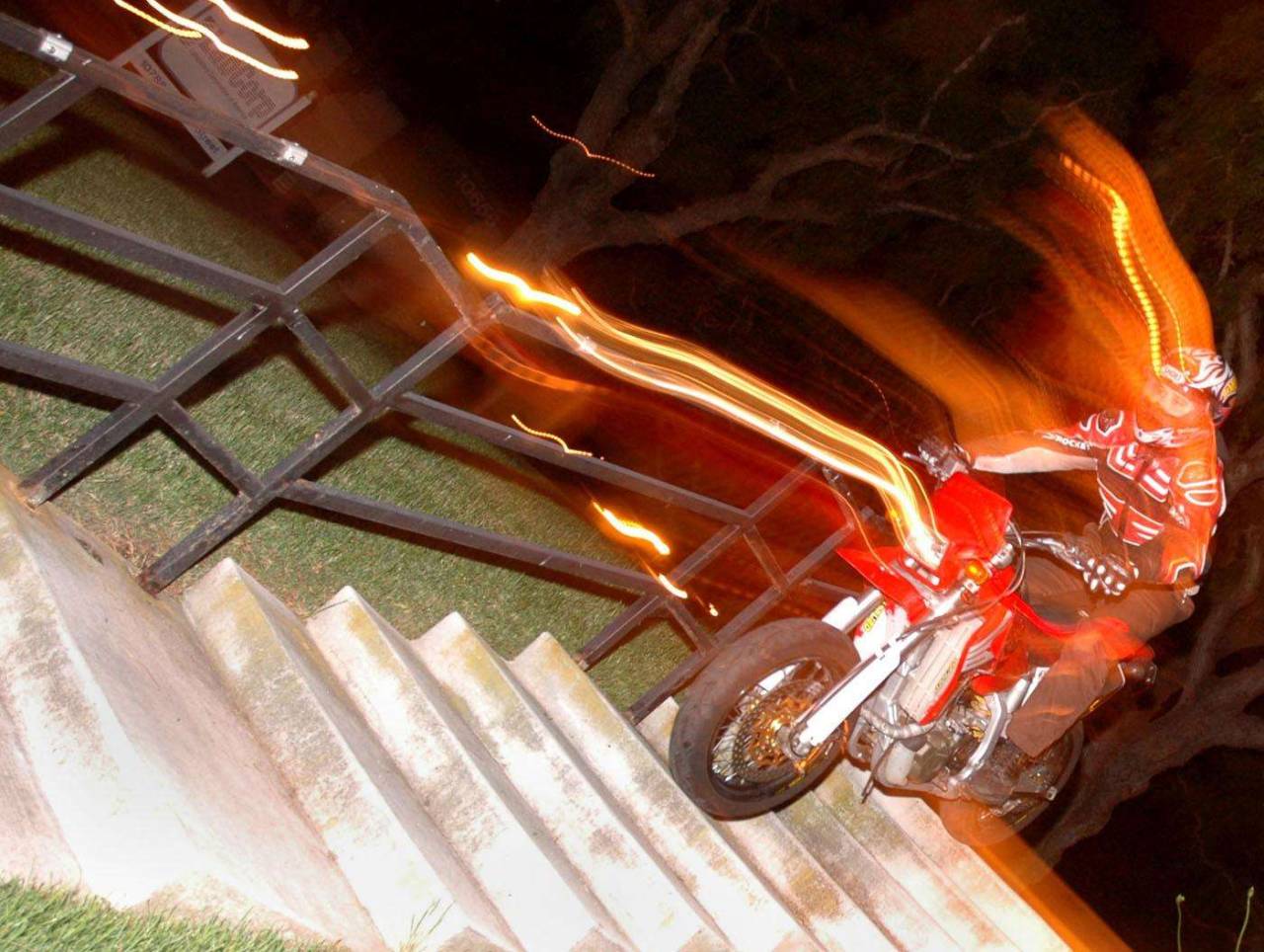 Supermoto night long exposure stairs motorcycle hooliganry