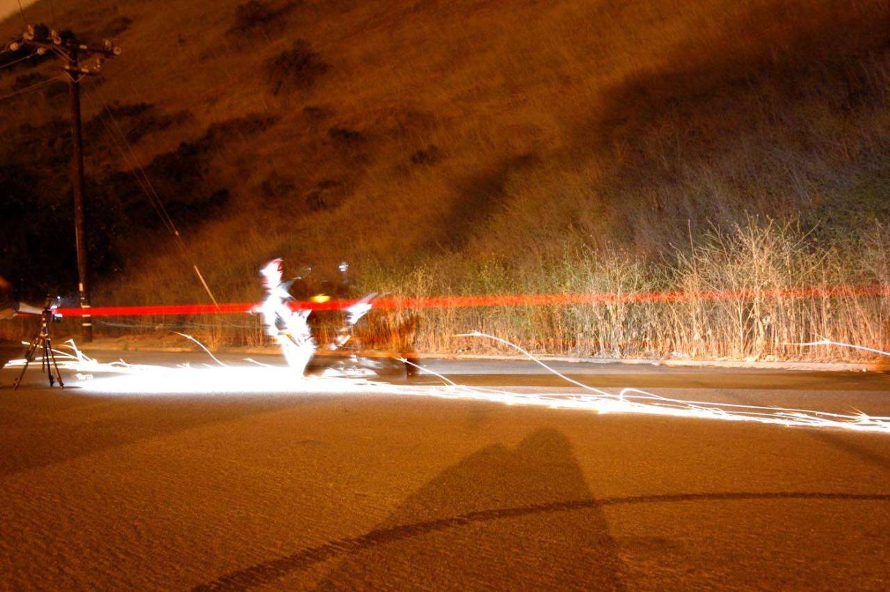 Motorcycle dragging knee sparks film photography night long exposure