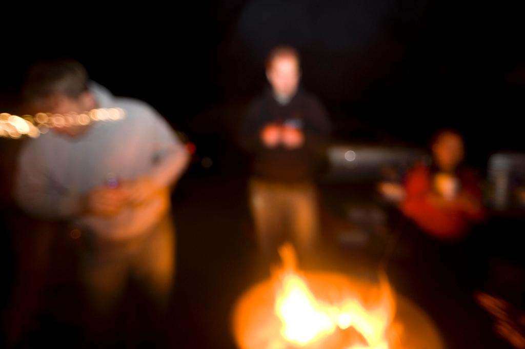 Camping night photography slow shutter fire blur