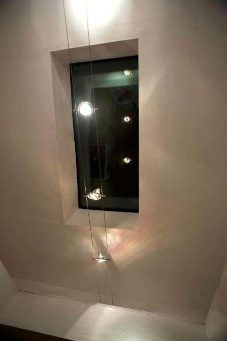 Cable lights under skylight