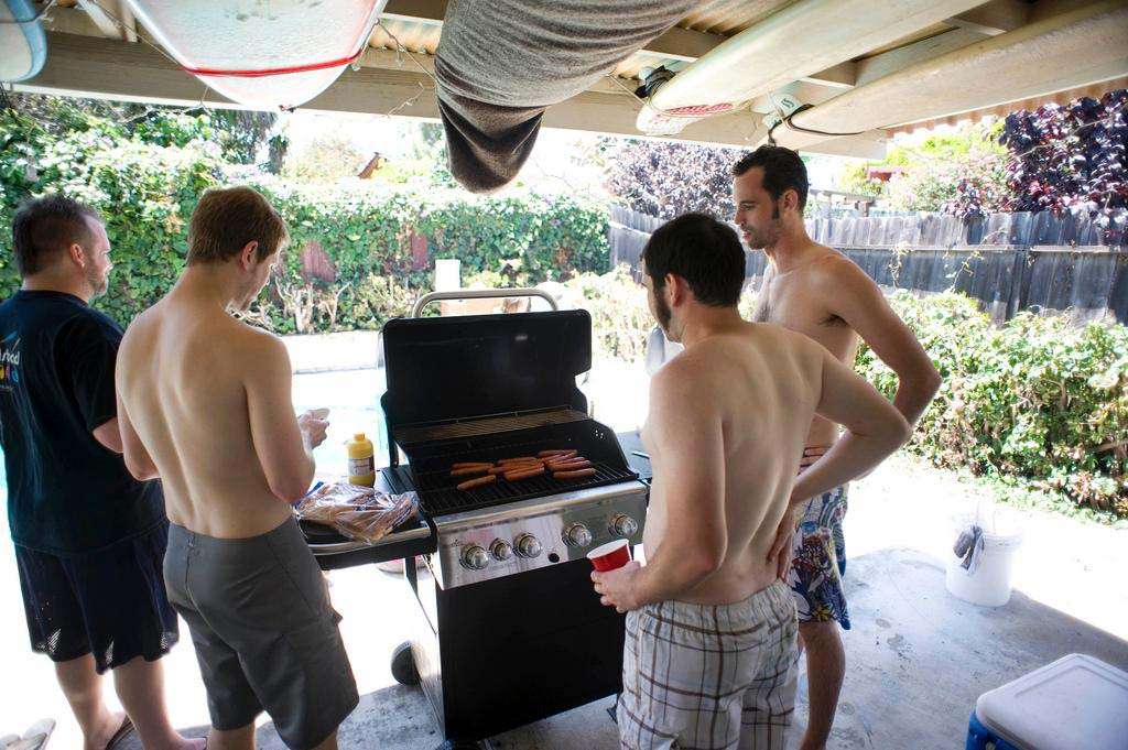 Pool party grill hot dogs surfboard overhang