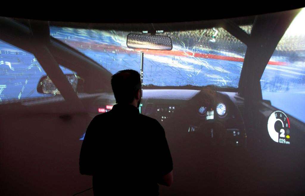 E3 2011 driving game curved projector screen