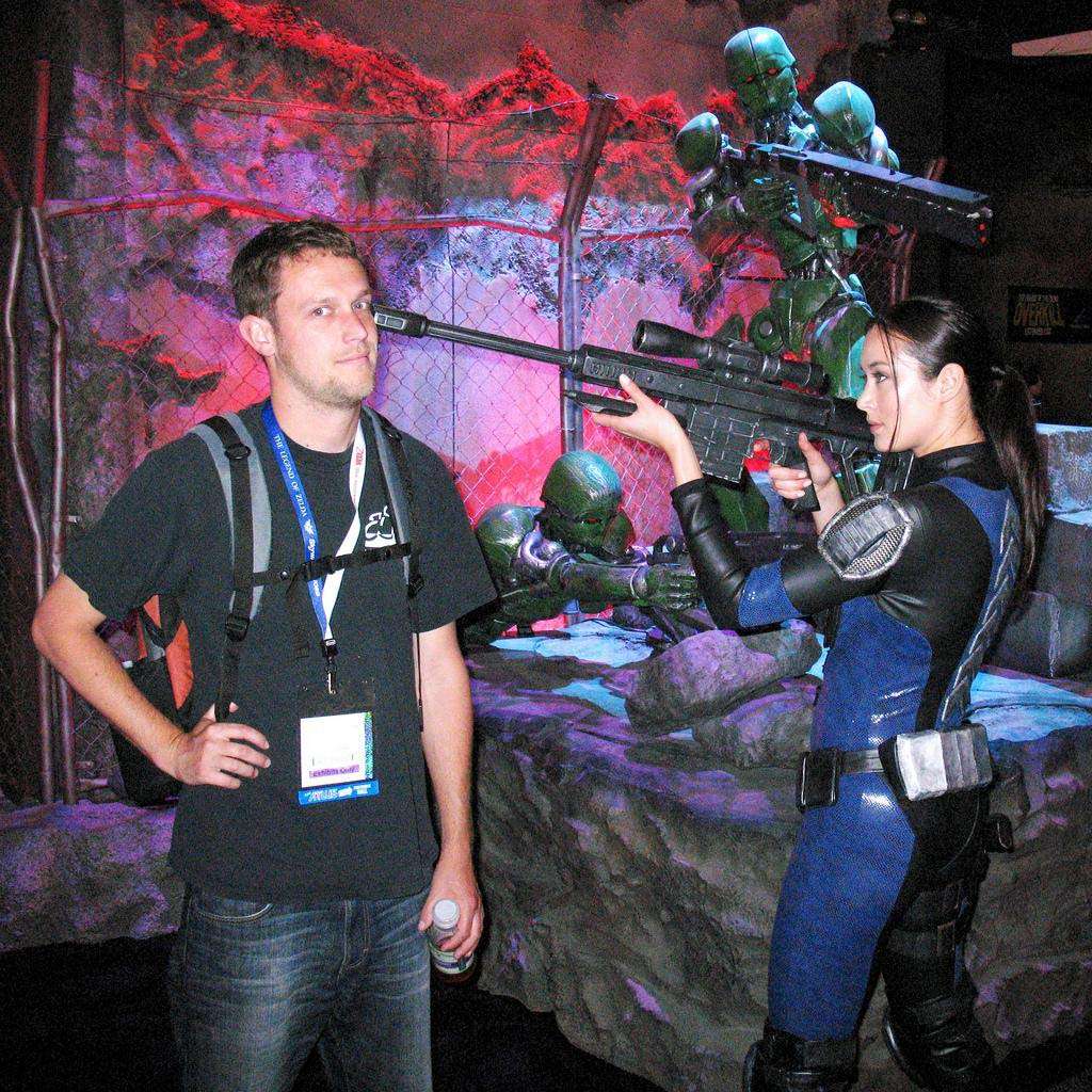 E3 2011 booth babe sniper rifle yesscope head shot