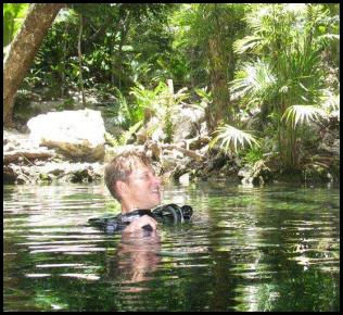 Cenote dive Cancun Mexico surface jungle