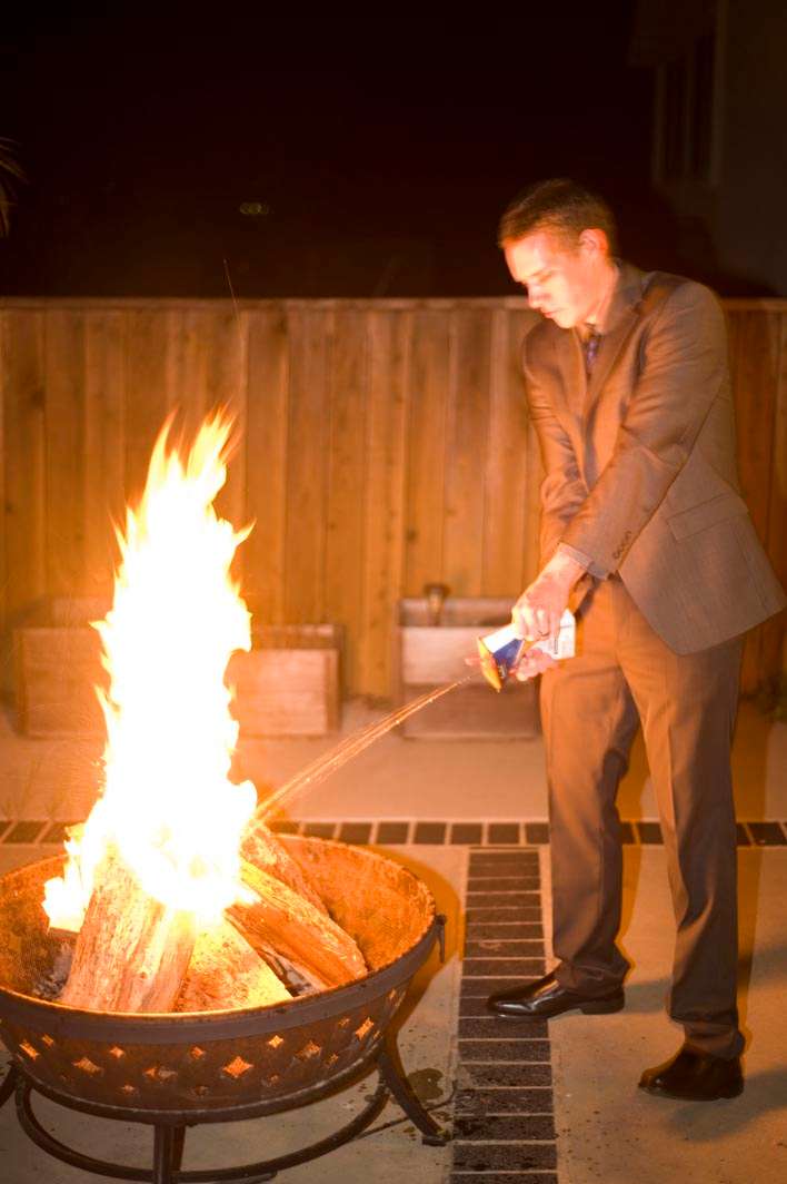Fire pit barbecue lighter fluid