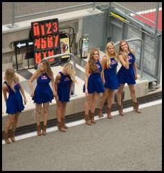 2014 MotoGP Austin Texas Red Bull umbrella girls pit lane