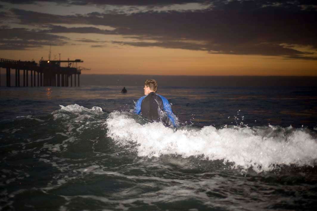 Night surf nightsurf Scripps pier low light sunset