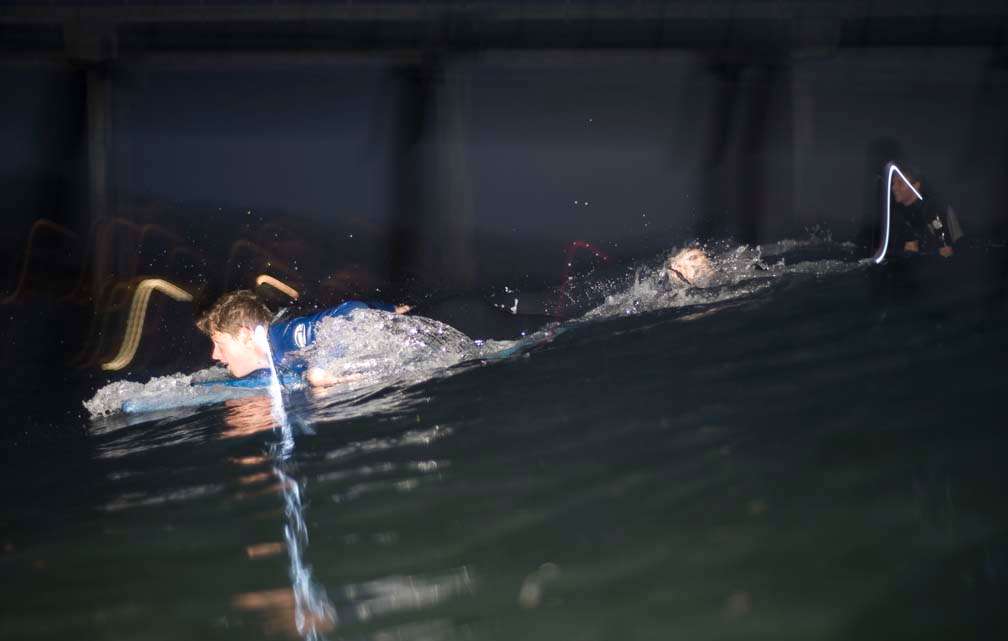 Night surf nightsurf paddle wavestorm Scripps pier
