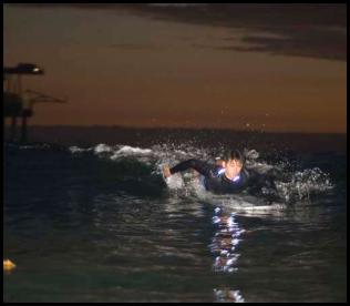 Night surf nightsurf Scripps pier paddle longboard