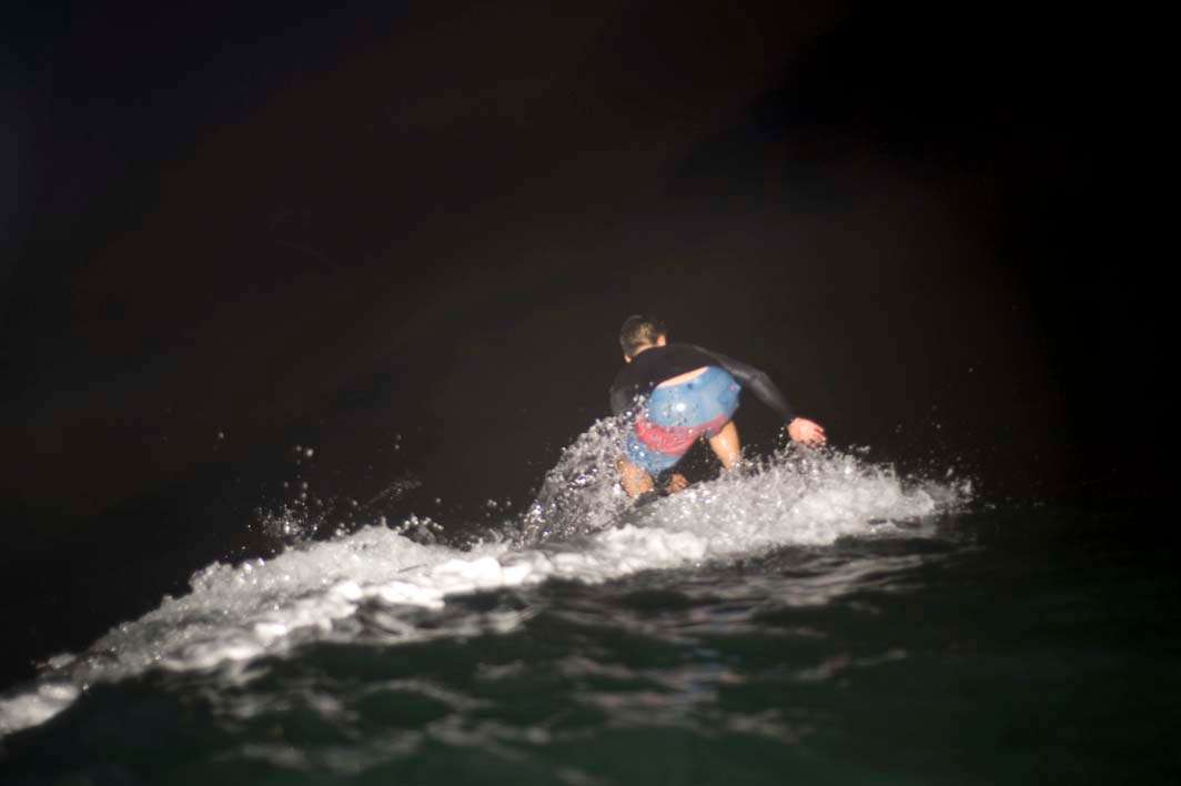 Night surf nightsurf Scripps pier ride right behind
