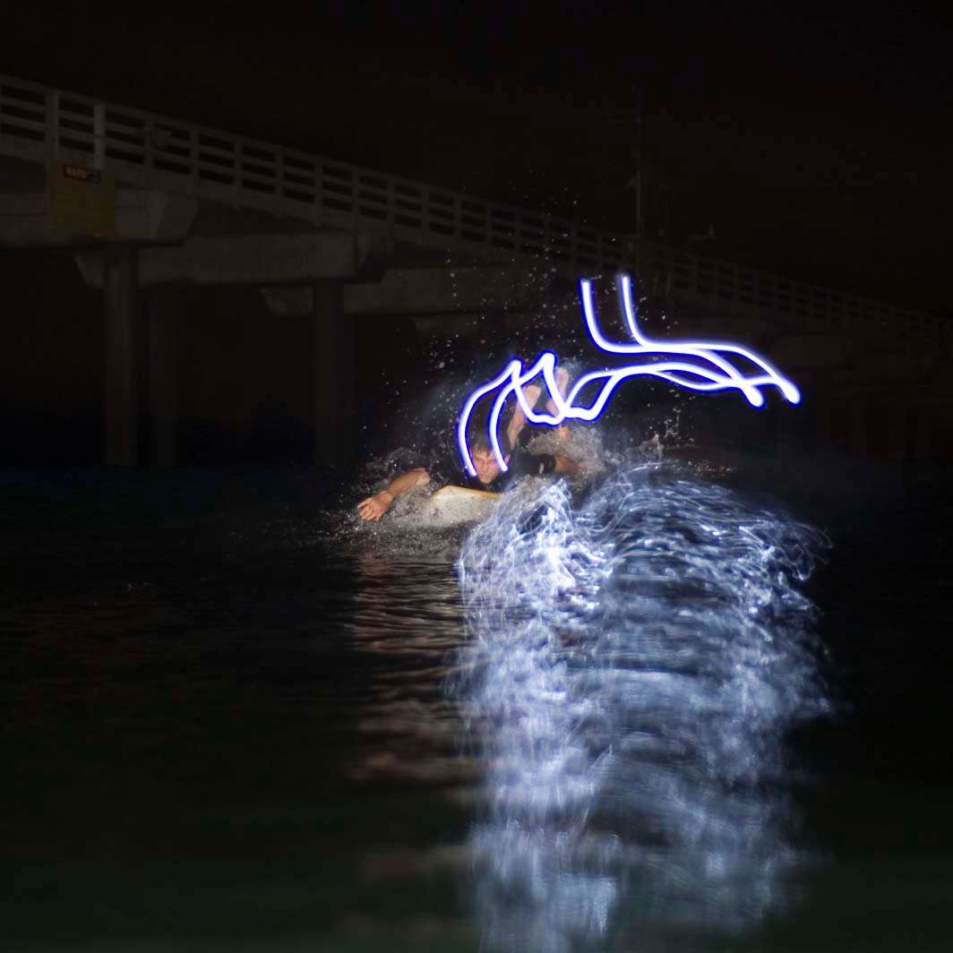 Night surf nightsurf paddle Scripps pier led