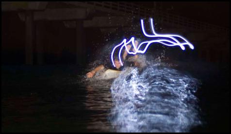 Night surf nightsurf paddle Scripps pier led