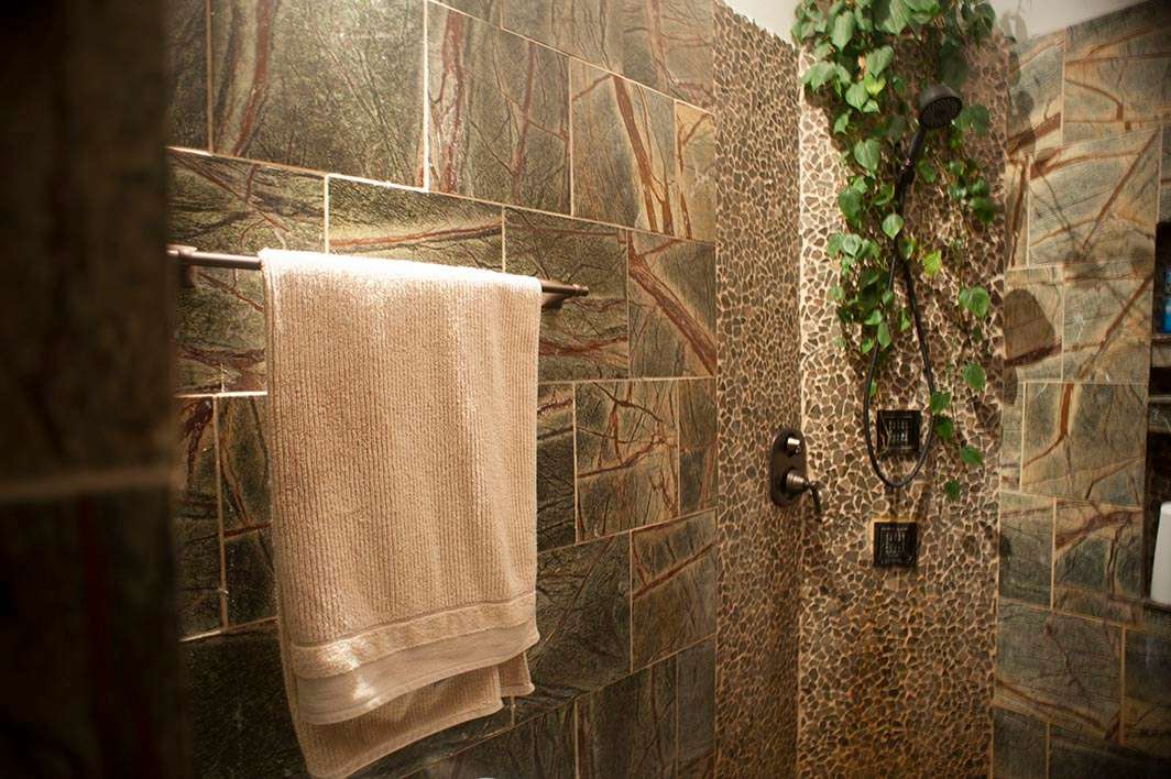 Jado 020 towel bar mounted on tile