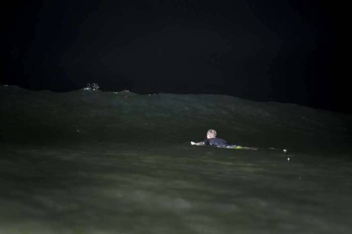 Surfing nightsurfing Scripps Pier La Jolla duck dive ominous