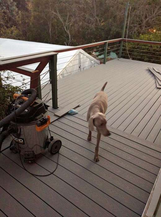 Deck plank installation gray Trex retrofit dog shop vac