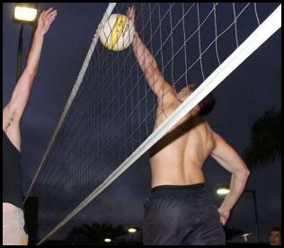 Beach volleyball block night flash