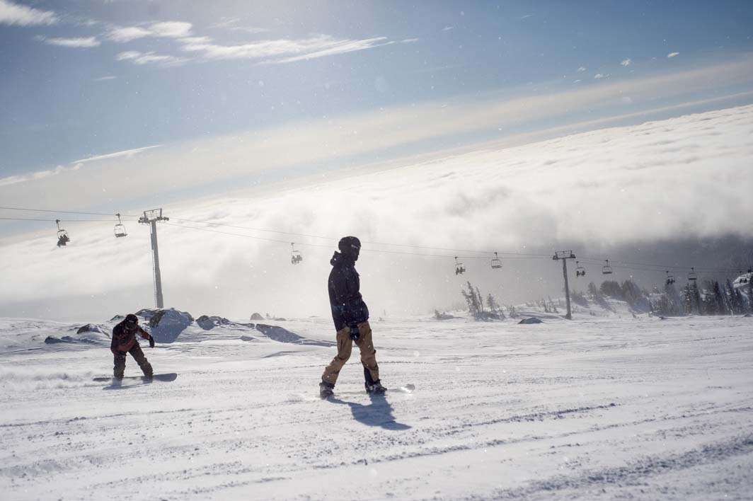 Skiing snowboarding Mount Hood peak weather view clouds