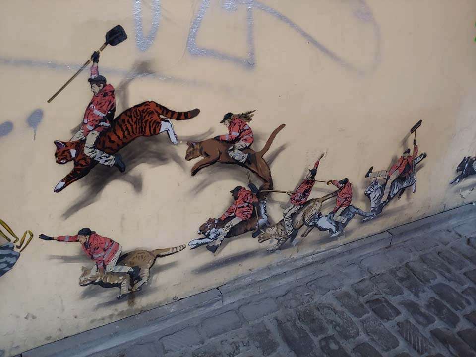Brussels Belgium graffiti people riding cats