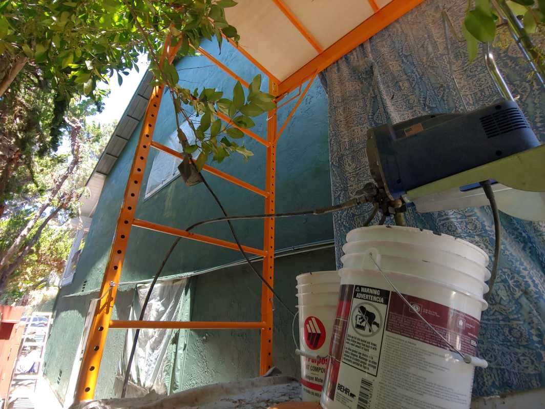 Scaffolding paint sprayer setup