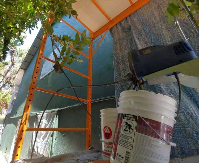 Scaffolding paint sprayer setup