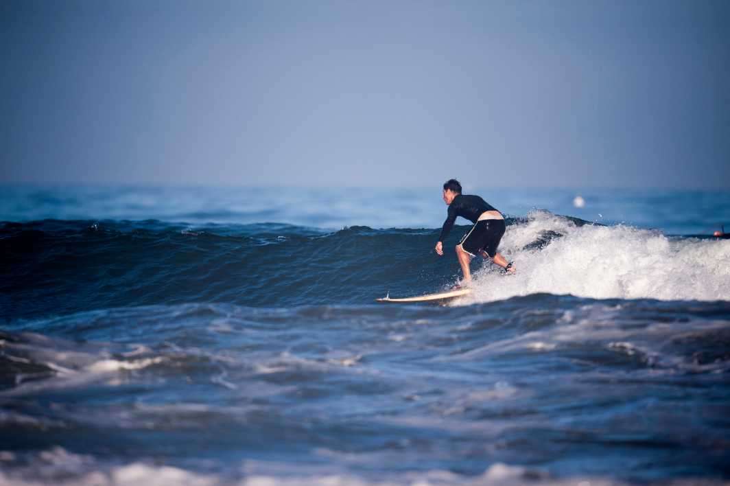 Surf surfing telephoto Scripps Pier San Diego