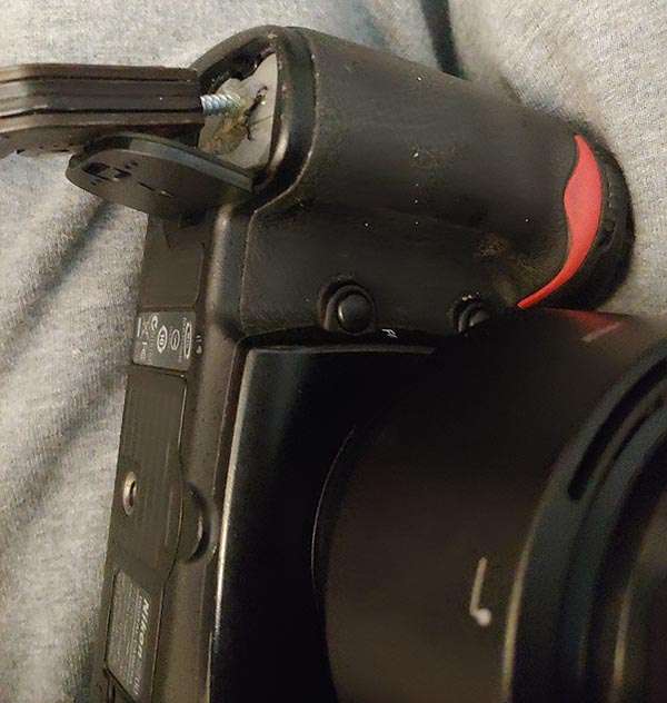Nikon D700 battery extraction gore