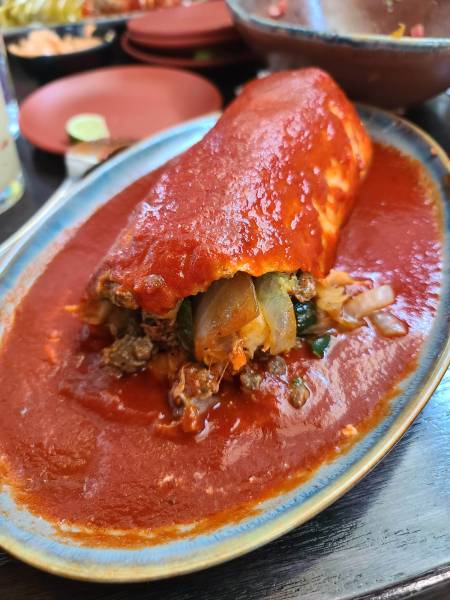 La Puerta California burrito wet red sauce