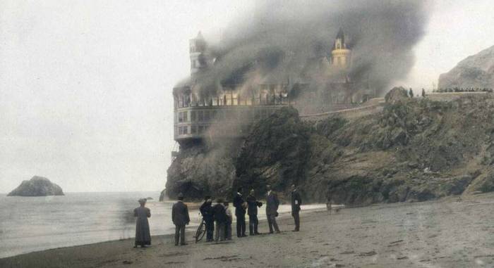 San Franscisco cliff house burning on fire onlookers retouched