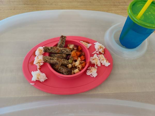 Toddler meal plating sausage soup rice balls