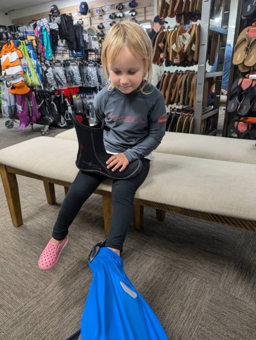 Trying on dive fins