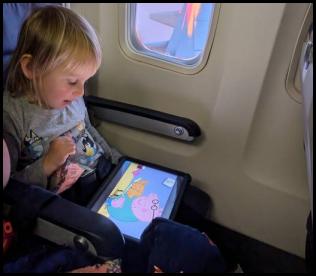 Southwest flight sunset Peppa Pig on the tablet